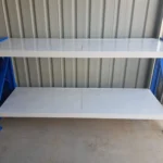 metal shelving with blue supports