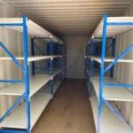 empty container with shelving rows